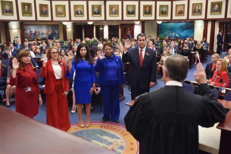 Rep. Josie Tomkow (second from left) being sworn in to the Florida House of Representatives at the age of 22 on May 1, 2018 . Photo by Florida House