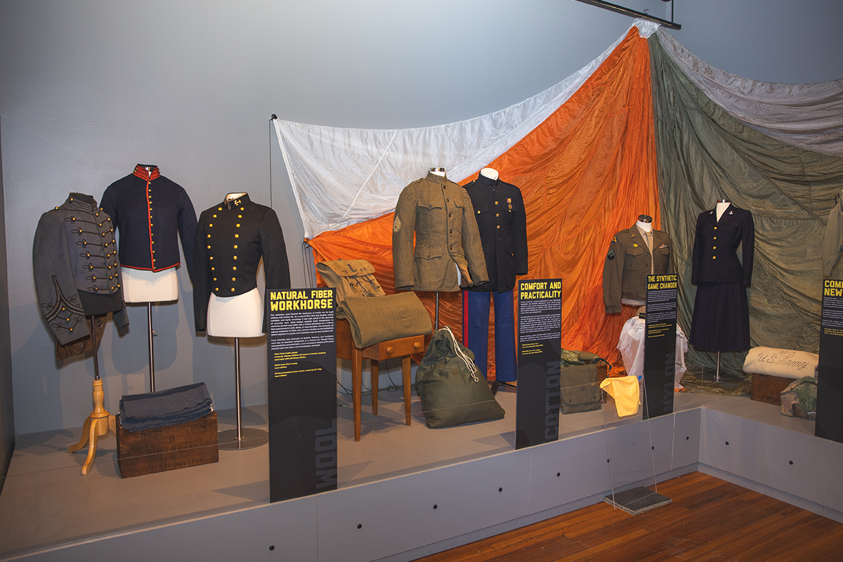 "Dressing History: Fabric of War" display in the Pensacola Museum of History